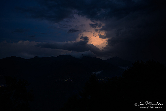 At end of sunset last bit of sun beams into a cloud (1 visits) At end of sunset last bit of sun beams into a cloud