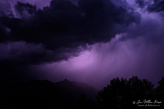 Thunderstorm in Val d'Hérens with in the distance the mountain La Maya