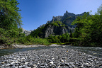 Mountain peak Corne du Chamois (Chamois Horns, 2523m) seen from the river Le Giffre